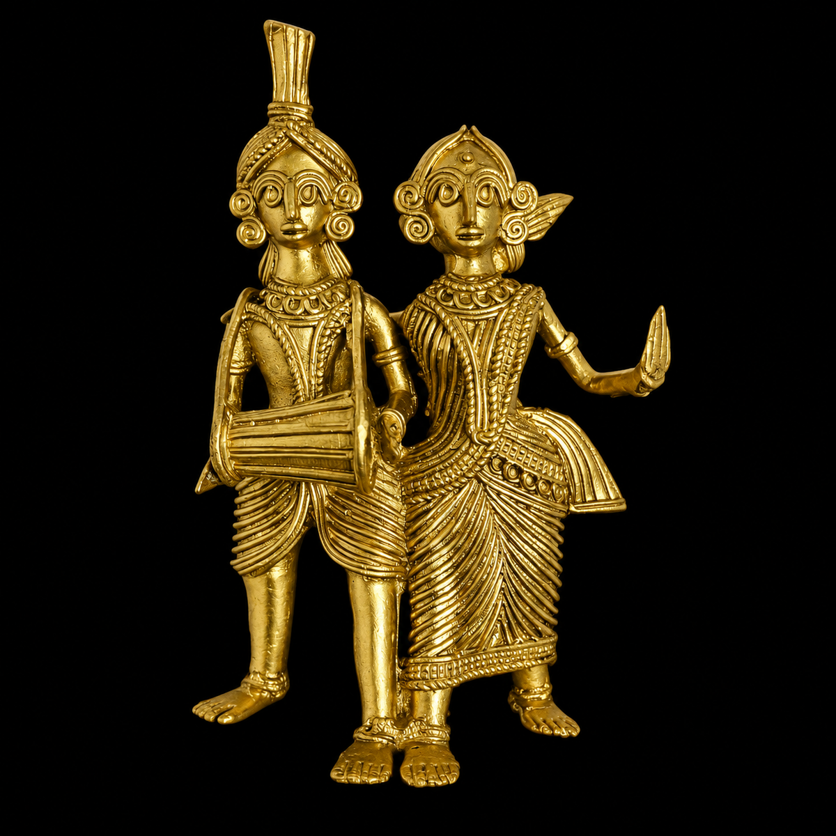A pair of Dokra Musician figurines standing side by side against a solid black background